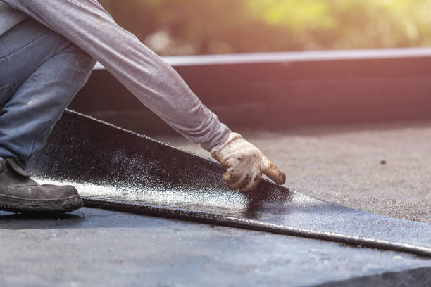 Professional Basement Waterproofing technician working in Ada, OH